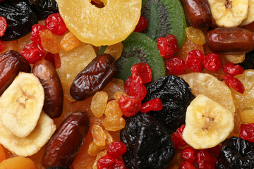 Mix of different dried fruits as background, closeup
