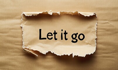 Creative expression with the message Let it go on ripped paper.