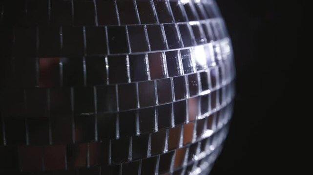 "Sparkling Disco Ball with Glittering Reflections and Party Lights"

