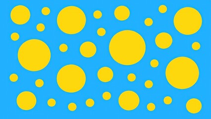 a collection of yellow circles of varying sizes against a light blue background