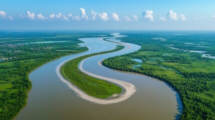 Aerial view of a meandering river flowing through lush green landscape.
