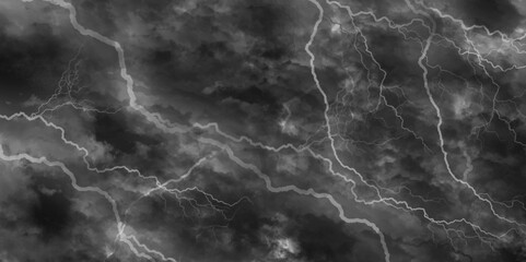 Thunder, lightnings and rain on a stormy summer night in black and white. Lightning bolts in the sky at night. 
