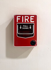 Fire alarm system located indoors with a pull down feature for emergencies in a public building...