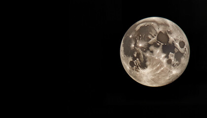 Obraz premium Moon’s craters illuminated against deep black sky, celestial wonder