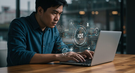 A data scientist coding smart systems, visualizing cybersecurity trends through holographic UI elements on a laptop