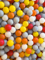 Colorful assortment of plastic balls fills play area in a recreational facility