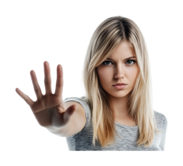 Confident young woman showing hand gesture conveying stop or pause in a casual setting indoors during daytime, cut out