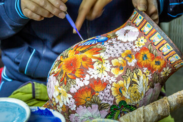 Chinese vase being created. Chinese ceramics is in development since pre-dynastic times and the first pottery was made during the Palaeolithic era.
