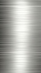 Fototapeta premium Metal Surface Texture: A close-up of a sleek, metallic surface with a brushed texture, capturing the interplay of light and shadow across its reflective plane.