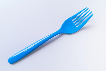 Plastic fork isolated on white background, Selective focus plastic kitchenware on white background.