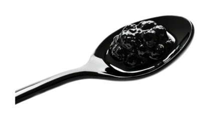 Luxurious black caviar served on a glossy spoon for gourmet tasting experiences and culinary delights, cut out