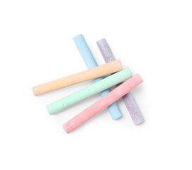 Pieces of colorful chalks on white background