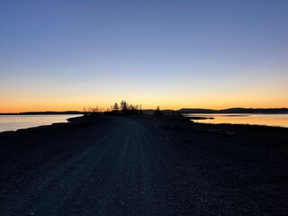 Sunset Over a Quiet Road.