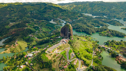 Stunning Aerial View of Guatapé Rock Surrounded by Lush Green Hills and Lakes in Antioquia, Colombia
