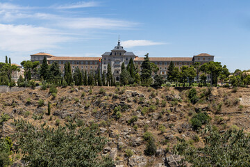 Fototapeta premium Toledo, Spain, a breathtaking fusion of medieval history, stunning architecture, and cultural heritage. Its historic center, cathedrals, and ancient streets create the setting for visual storytelling.