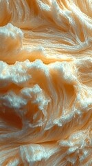 Obraz premium Soft Whispers: A macro shot captures the gentle curves and ethereal texture of a soft, fluffy cloud, inviting touch and evoking a sense of comfort and calm.
