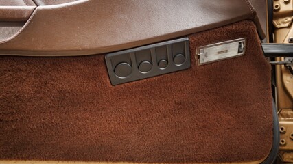 Coin holder on a car door