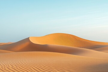 A serene desert landscape featuring smooth, undulating sand dunes under a clear sky, creating a sense of calm and vastness.