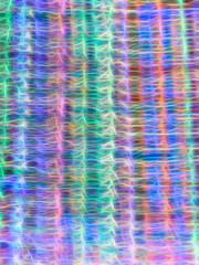 Wavelike pattern of light trails of light-emitting diodes (LEDs) at a holiday light show in a...