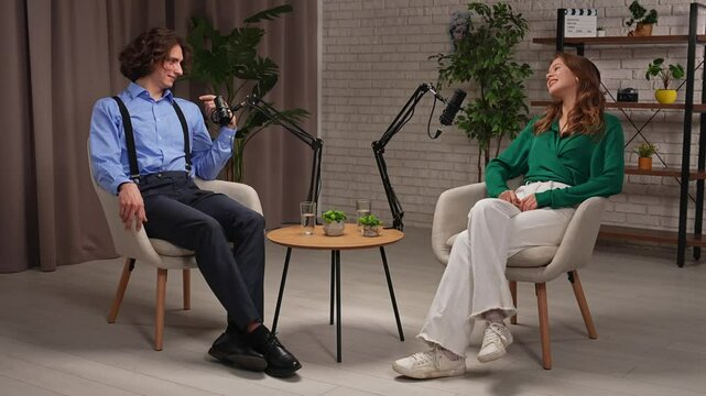 Engaging Podcast Interview in a Modern Studio Setting With Two Dynamic Hosts