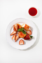 Top view Breakfast cheese cottage pancakes beries and jam on plate