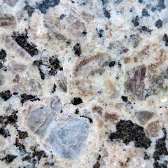 granite, a hard and resistant igneous rock, formed by the cooling of magma deep within the continental crust. It is composed of quartz, feldspar and mica. Texture