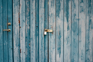 Old painted doors from cottages in the countryside.
