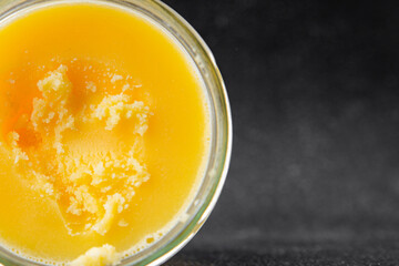Ghee butter or clarified butter delicious gourmet food background on the table rustic food top view copy space keto and paleo diet vegetarian and vegan food