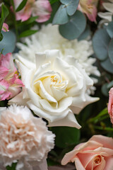 Delicate white and pink roses close up