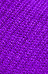Closeup the Texture of Purple Knitted Wool Fabric in Diagonal Patterns