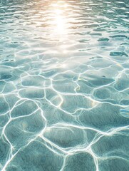 Fototapeta premium A serene view of clear water reflecting sunlight, creating a calming and tranquil atmosphere.