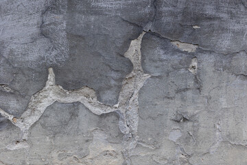 Background of destroyed concrete path, gray concrete, concrete texture, close-up. Natural photo. Old concrete slab