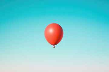 Fototapeta premium single vibrant red balloon suspended against expansive backdrop of serene blue sky illustrating unique abstract thinking