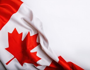 Canadian flag draped elegantly on a plain white background