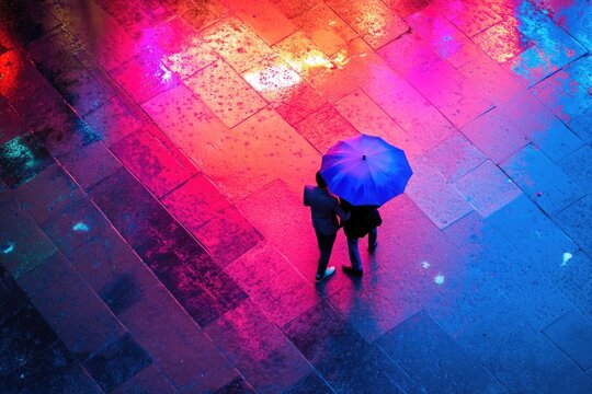 PEOPLE WITH UMBRELLAS ON Rain Day