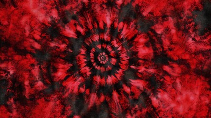 A red tie-dye pattern, with dark shades of crimson and scarlet, blending together in an intricate spiral design. The background is solid black to highlight the detailed texture of the fabric