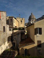 View of the city center. Elevations of historic tenement houses in the old city center. Rome, Italy.