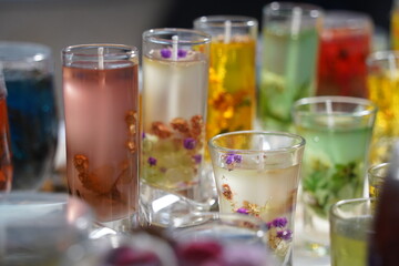Gel candles in glass bowls. Craft fair.