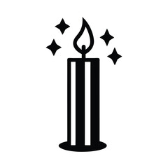 burning candle on black