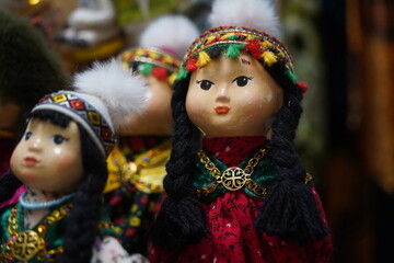 Dolls in Kazakh national costumes. Craft fair.