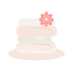 Neatly stacked towels with a floral touch
