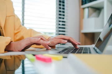 Typing on keyboard Working online on laptop computer On a white table at the office. Facebook chat. Web meeting. Blogger. Journalist writing an article. online job ideas