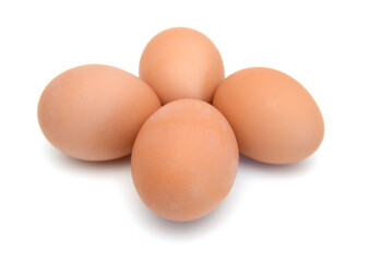 Raw eggs isolated on white background