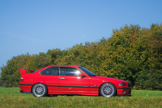 BMW M3 E36 german oldtimer vintage luxury sports car on a country road