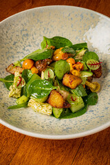 green salad with mushrooms and croutons,