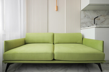 Sofa in the modern interior of the apartment