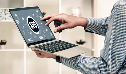 SEO search engine optimization for modish e-commerce and online retail business showing on computer...