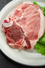 Pork on bones raw meat fresh tasty food dish delicious gourmet food background on the table rustic food top view copy space