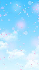 springtime blue sky with clouds and cherry petals falling nature ,vertical spring daytime with flowers and bokeh lights social media background	