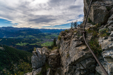 Breathtaking autumn view from the rocks of burgberg soaring over the picturesque alps